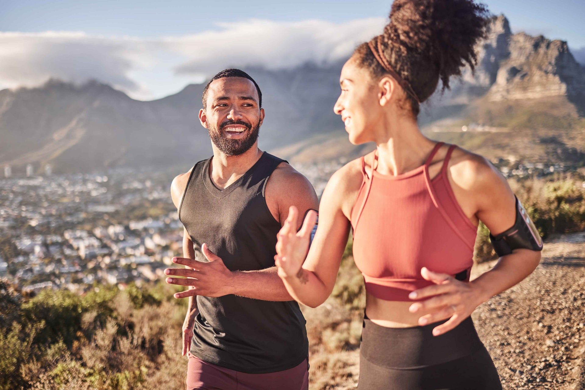 Two people being active and feeling healthy outdoors.