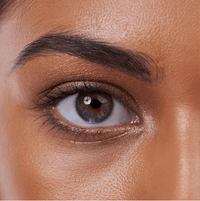 A close-up shot of a woman's eye indicates improved focus.