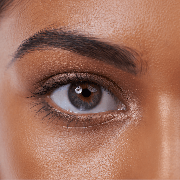A close-up shot of a woman's eye indicates improved focus.