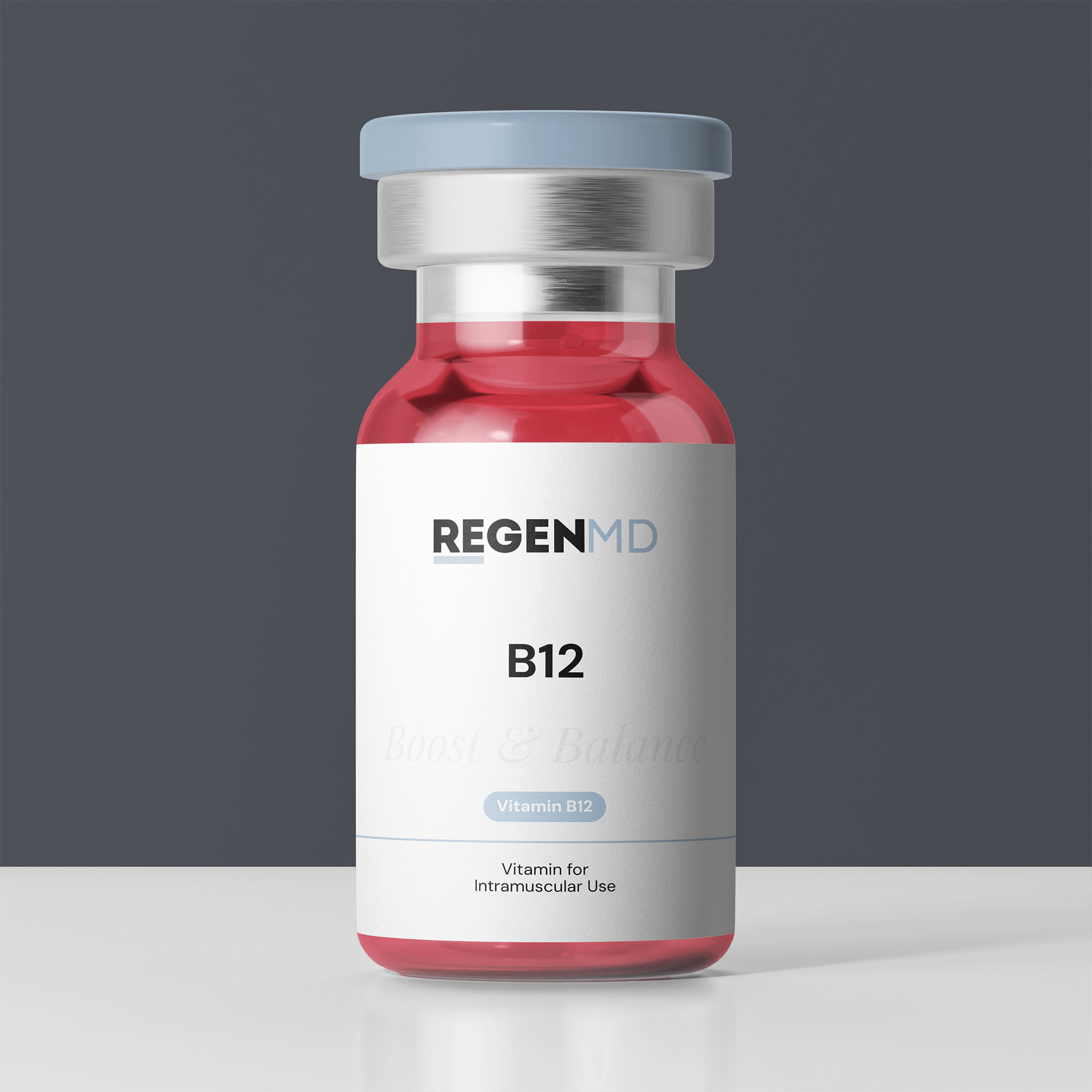 A vitamin B12 vial with red liquid inside.